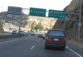 Mexican Federal Highway with sign to San Diego, CA – Best Places In The World To Retire – International Living